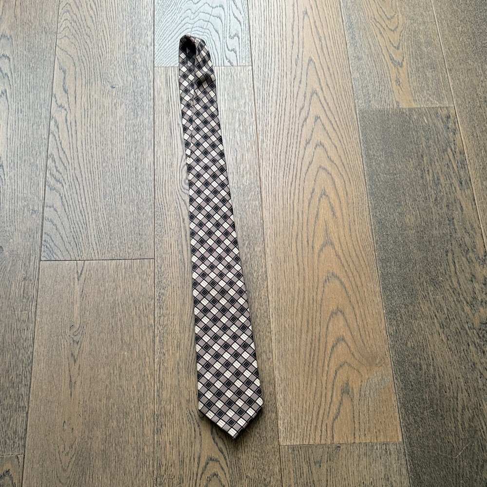 Men’s tie. Black, brown and beige.